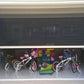 Motorized patio and garage screens providing sun protection and bug-free outdoor living space