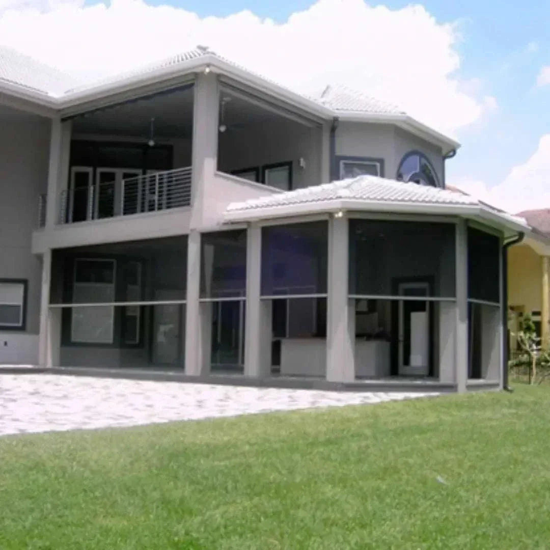 Motorized patio and garage screens providing sun protection and bug-free comfort with remote control operation