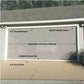 MotorizedWhite privacy  garage screens installed on a garage entrance, for sun and bug protection with remote control operation